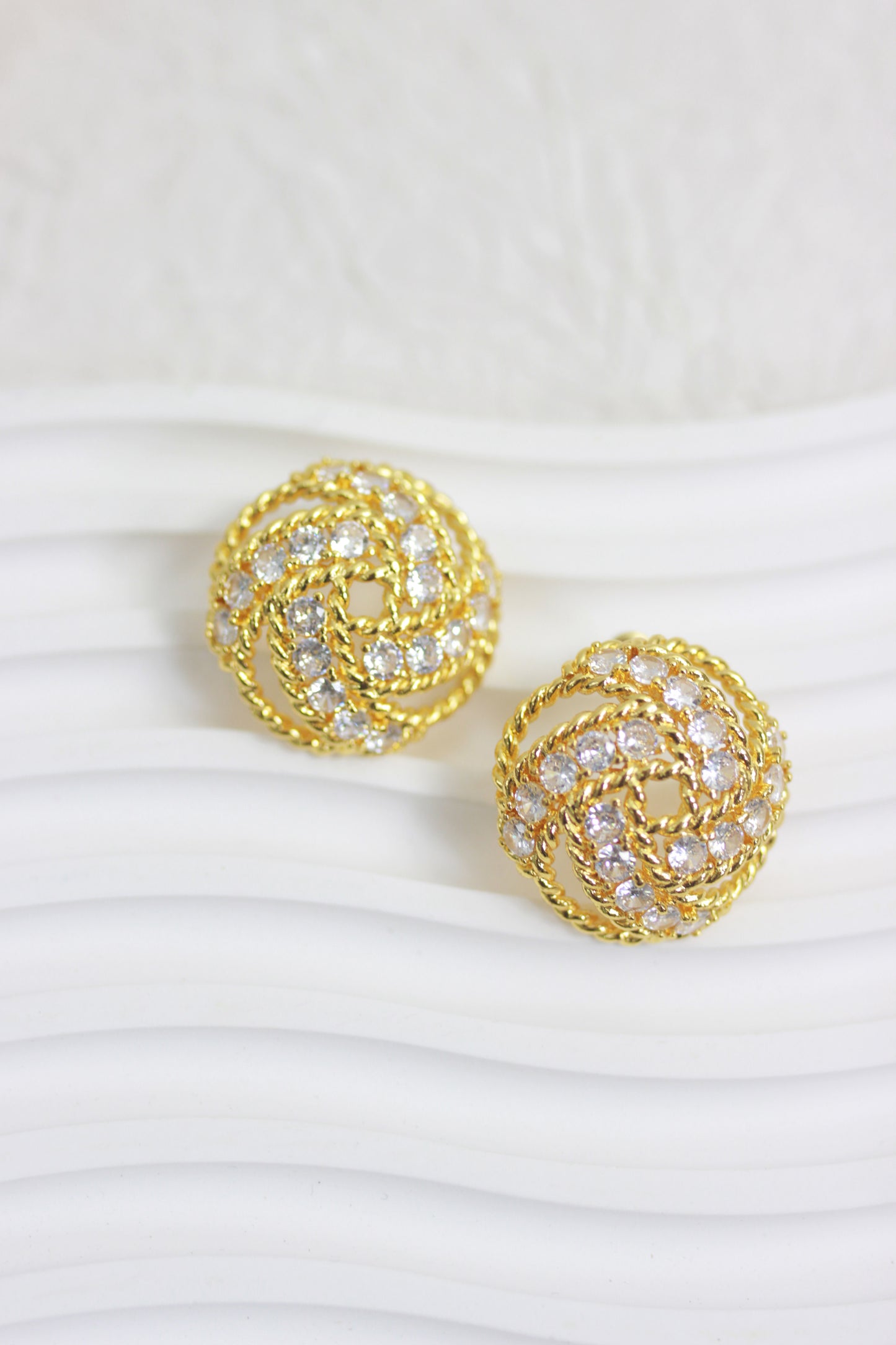 A2410ZM93335 - Gold Braided Crystal Knot Earrings
