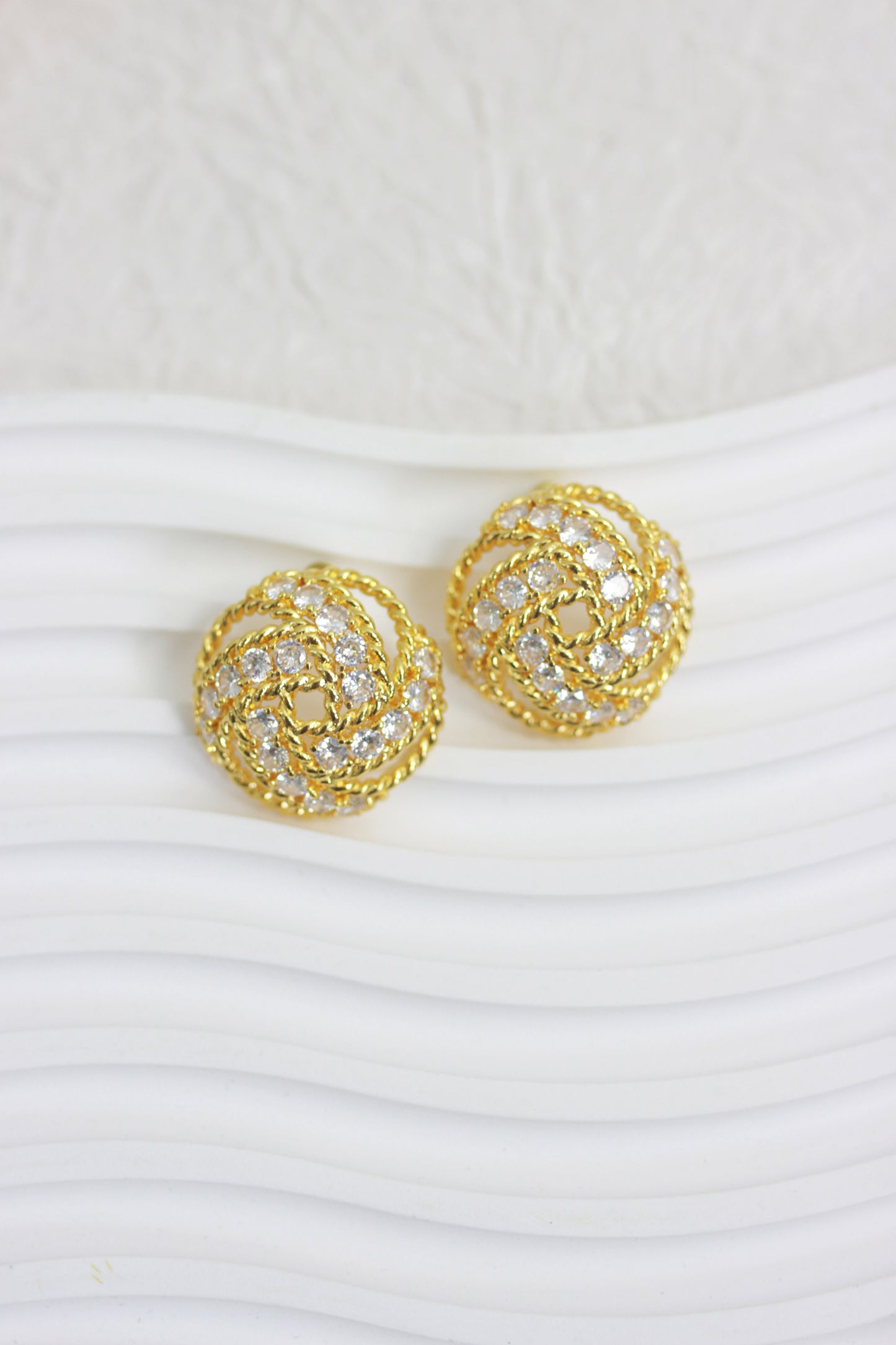 A2410ZM93335 - Gold Braided Crystal Knot Earrings
