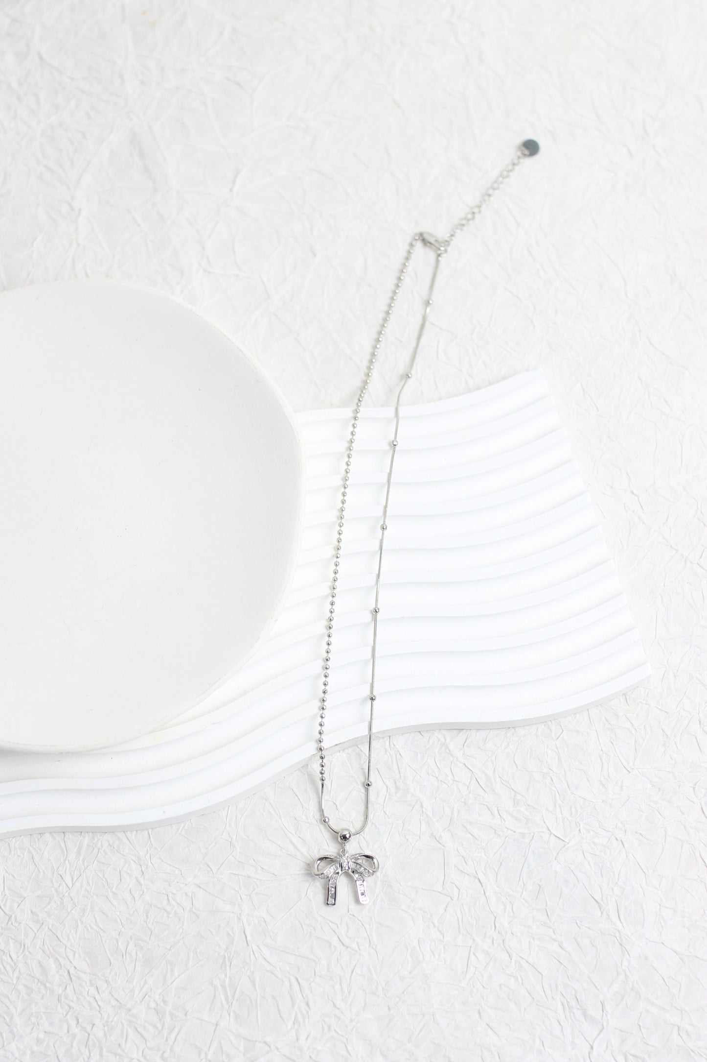 A2502HANF96297 - Elegant Silver Bow Pendant Necklace