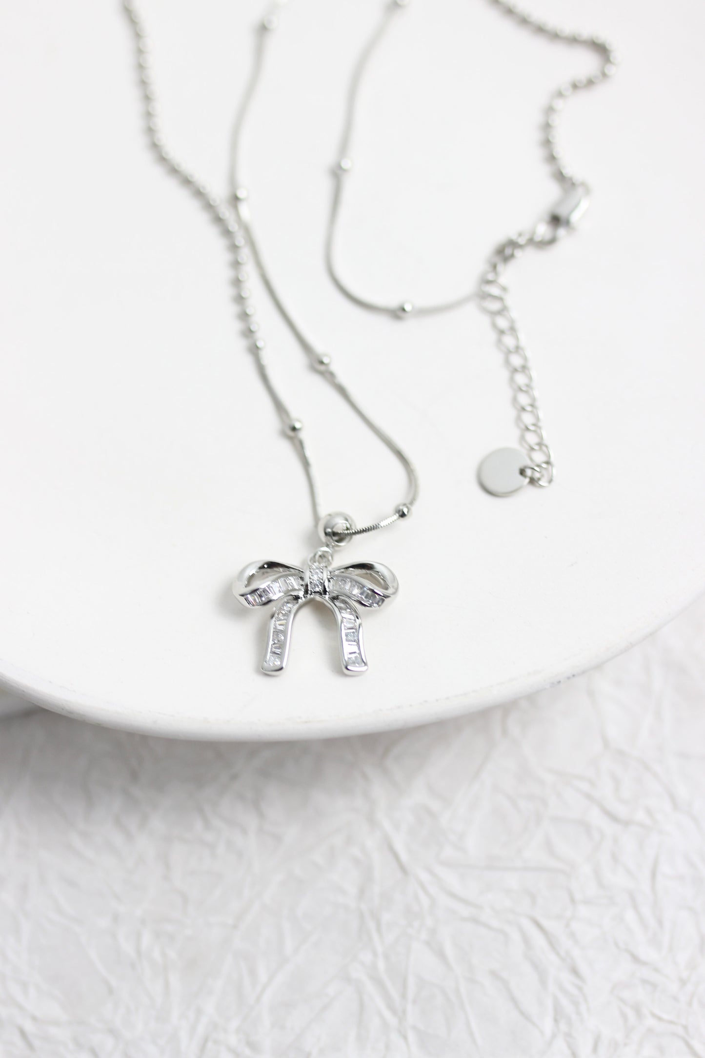 A2502HANF96297 - Elegant Silver Bow Pendant Necklace