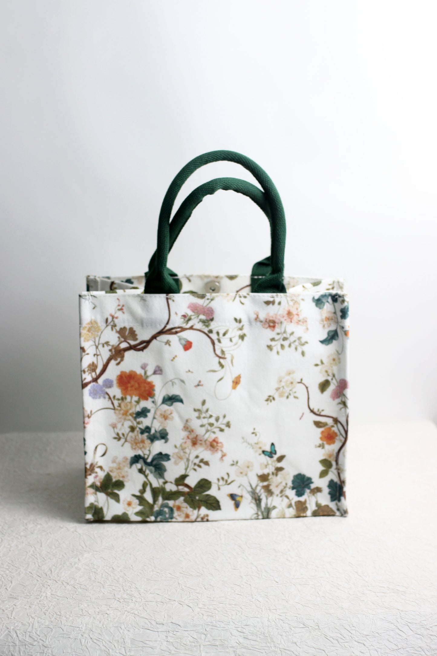 A2503CH82102 - Floral Canvas Tote Bag with Green Handles