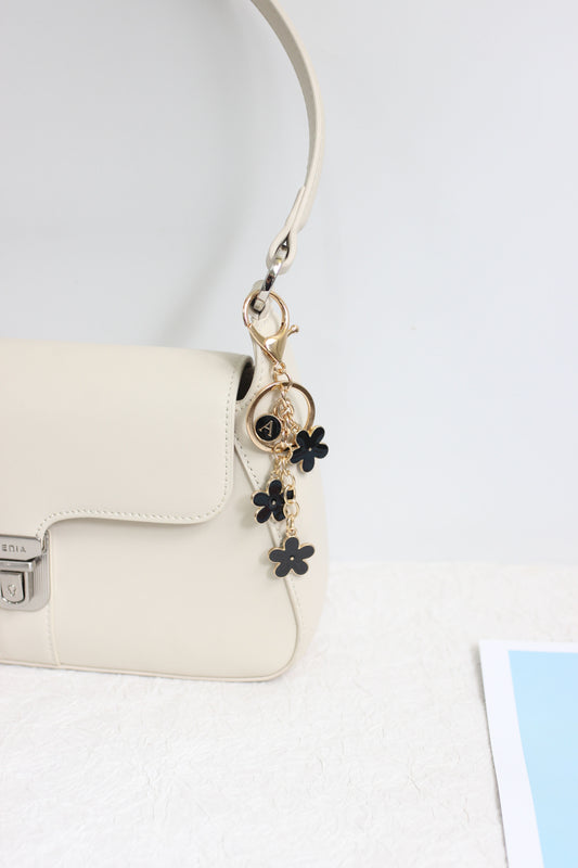 A2507HY20901 -Floral Monogram Keychain ¨C Daisy Letter Charm with Gold Hardware