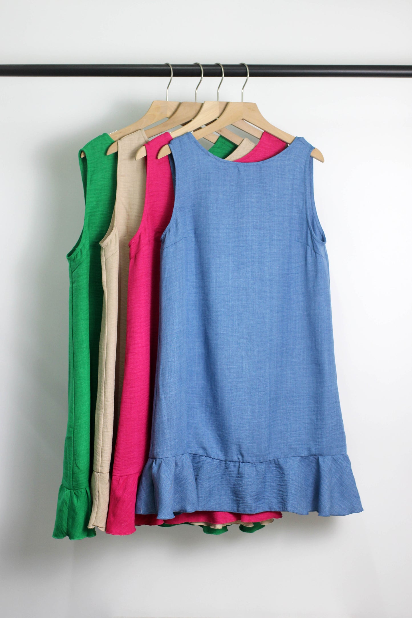 D2502GS21850 - Sleeveless Ruffle Hem Shift Dress with Back Bow Tie