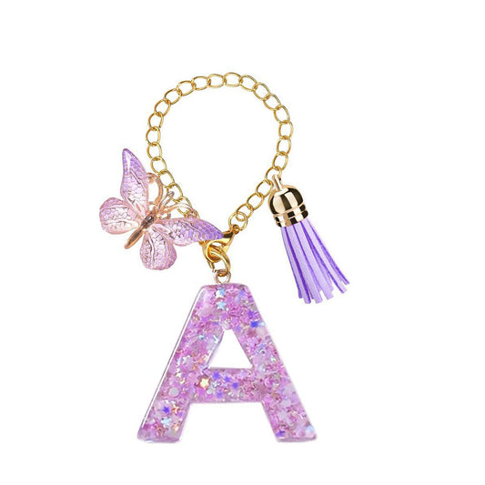 A2507HY68144 - Glitter Resin Letter Keychain ¨C Butterfly & Tassel Bag Charm