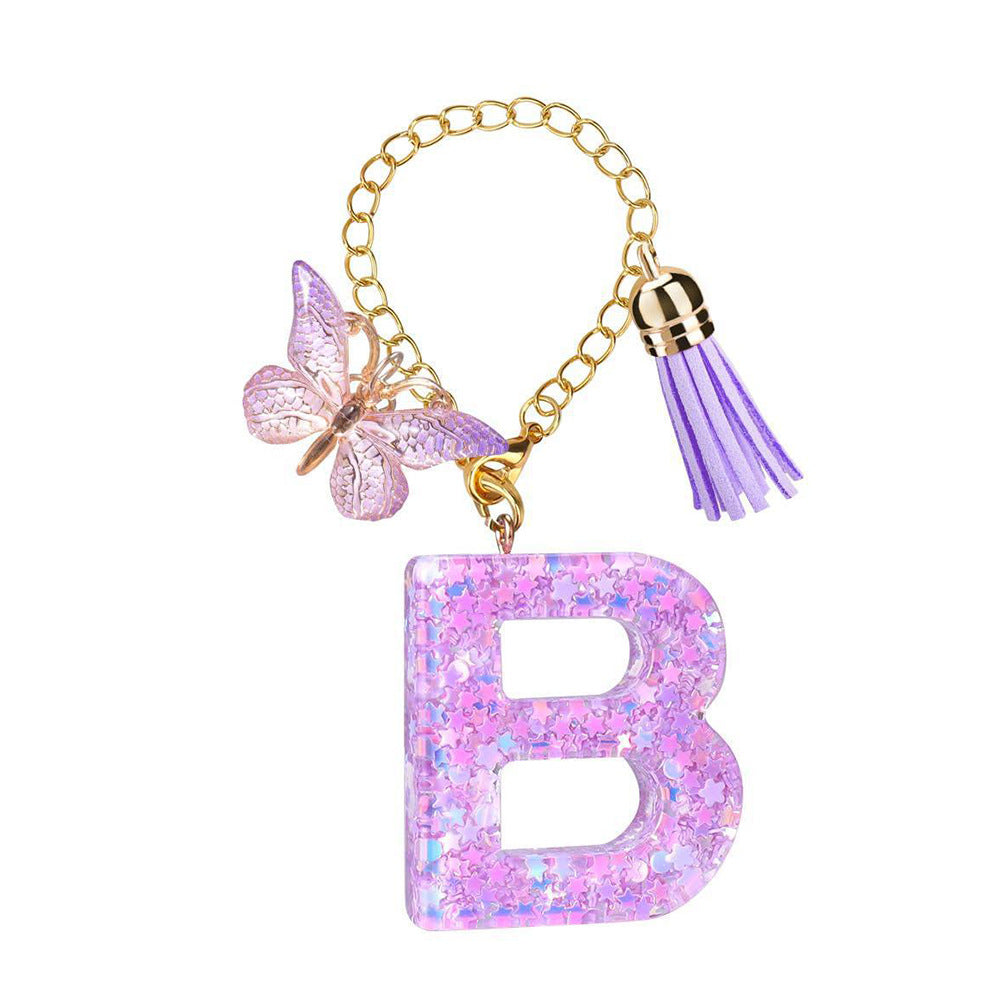 A2507HY68144 - Glitter Resin Letter Keychain ¨C Butterfly & Tassel Bag Charm